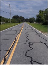 black lines filling in road cracks