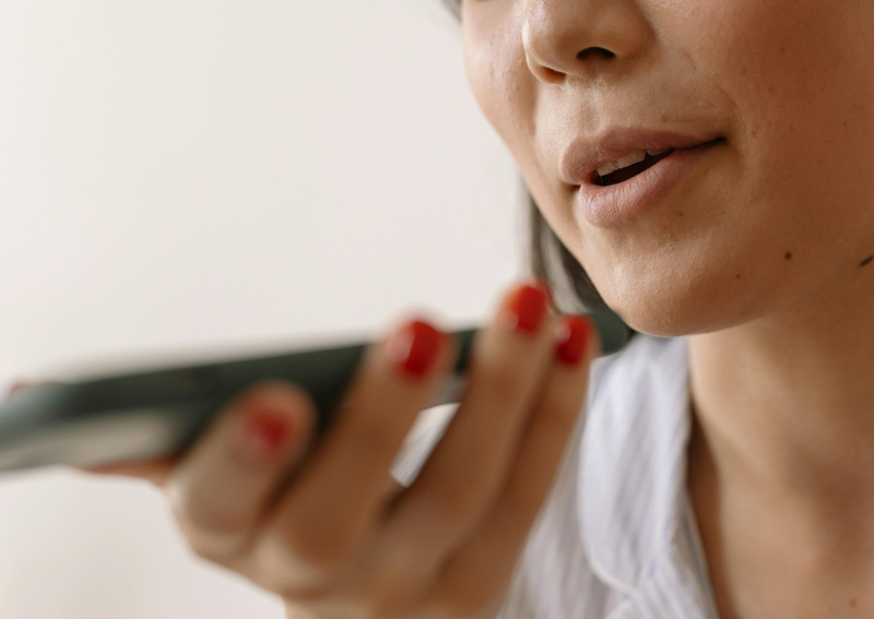 woman speaking into cell phone