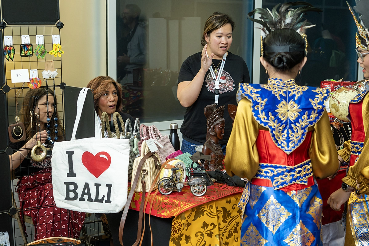 Attendees and vendors interacting at the 2025 Asian American and Pacific Islander Celebration