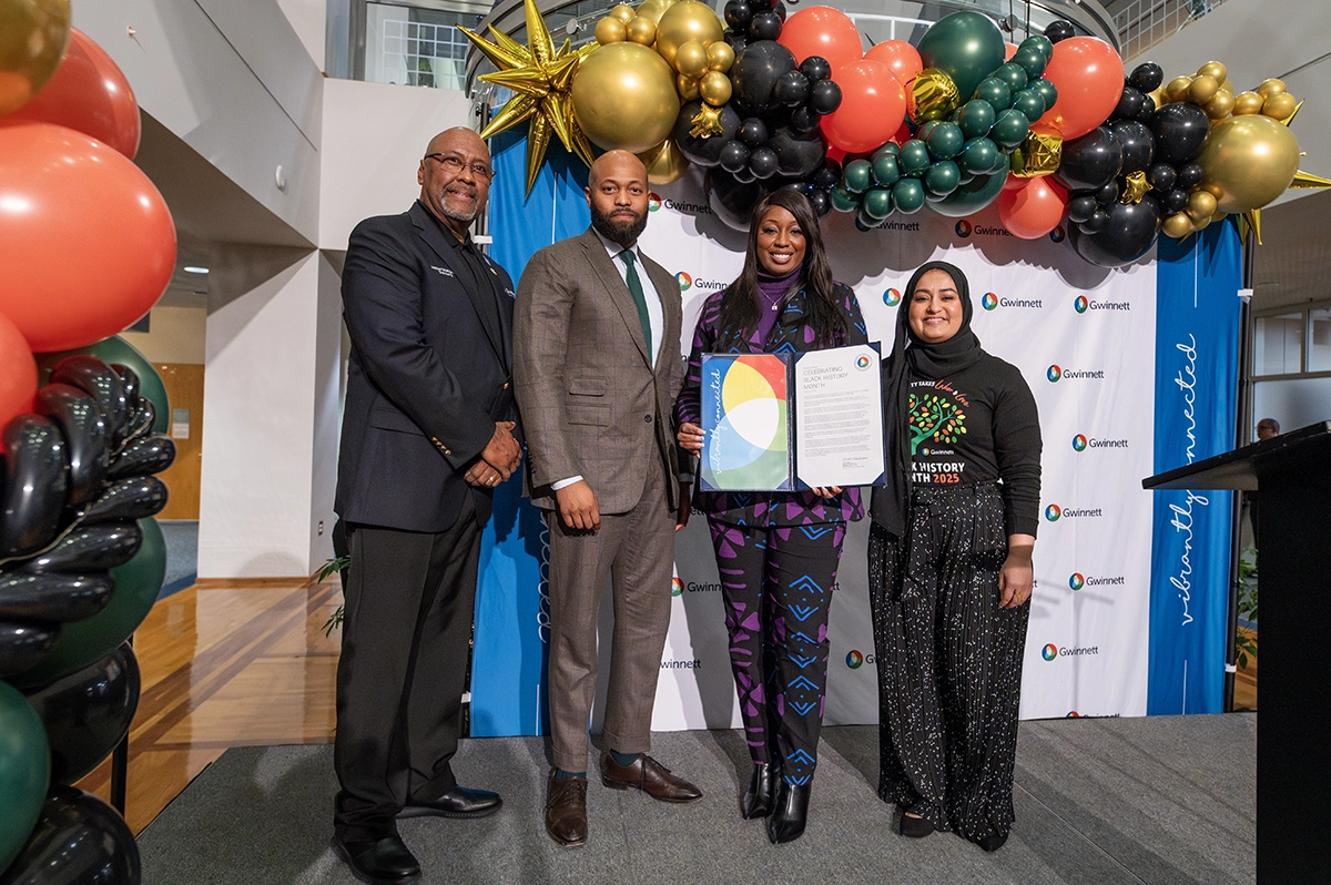 Chairwoman Nicole Love Hendrix and Commissioners presenting a proclamation celebrating Black History Month