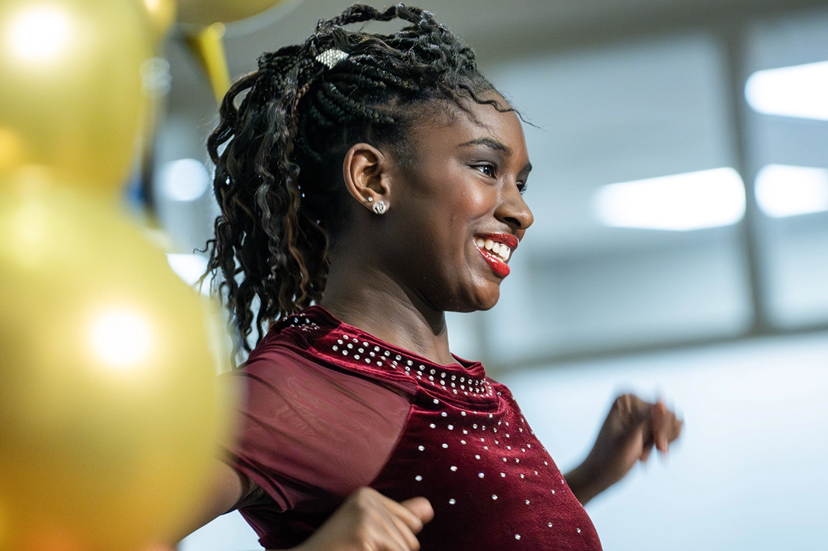 Female performer smiling