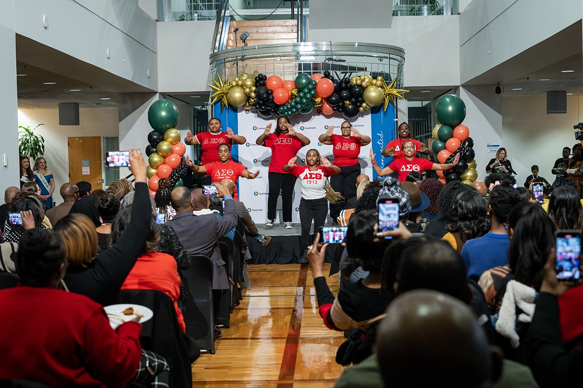 Group of performers dancing on stage