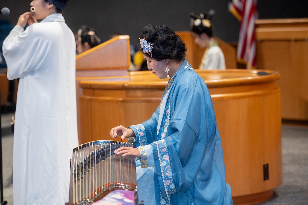 AAPI performers playing various instruments