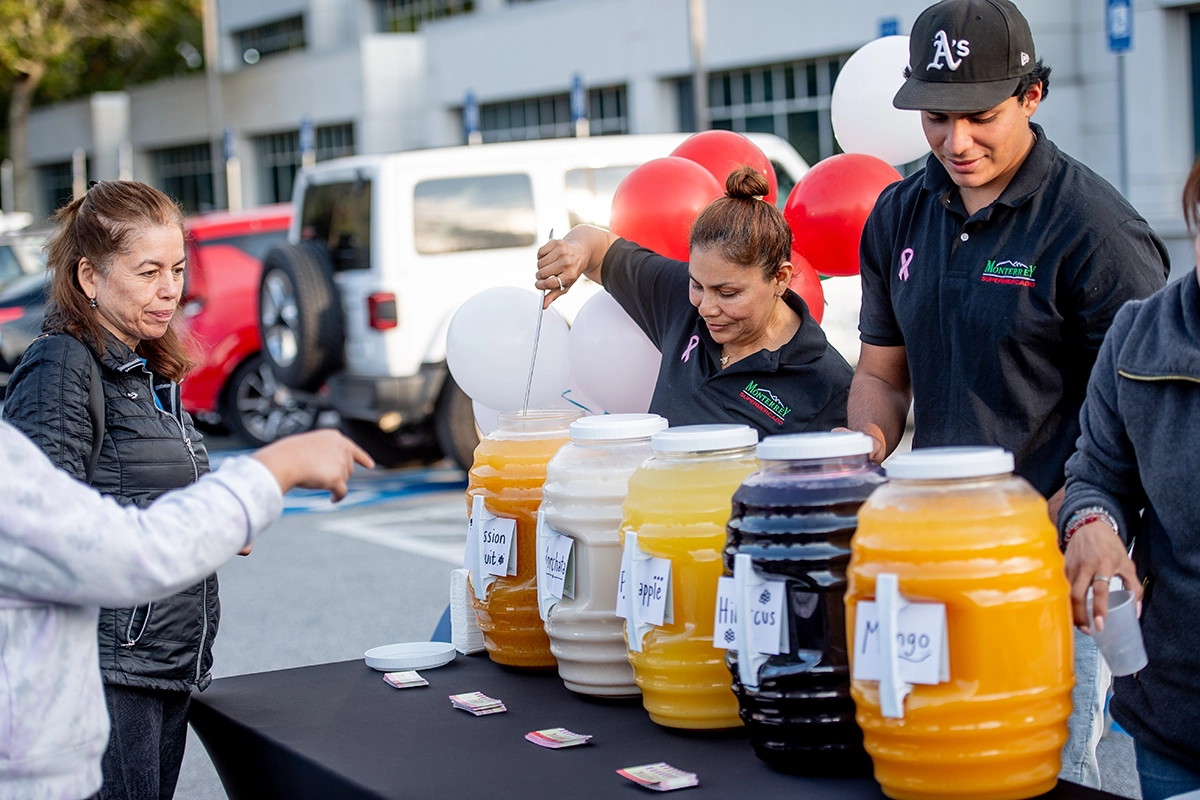 Vendors serving traditional drinks to the attendees
