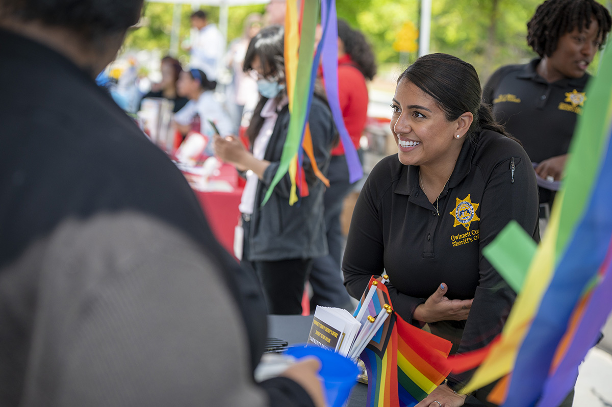 Gwinnett County Sheriffs Office table at the Pride party