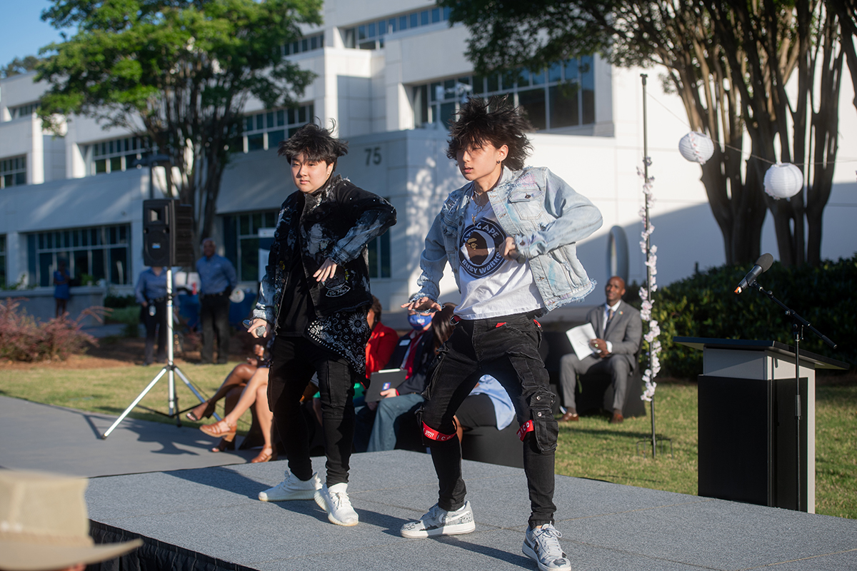 Performers dancing at the asian american and pacific islander celebration
