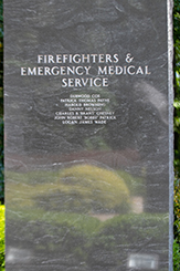 Granite marker honoring firefighters and emergency medical service members