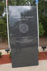 Granite marker honoring the founding of Gwinnett County in 1818