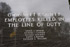 Granite marker honoring Gwinnett County employees killed in the line of duty