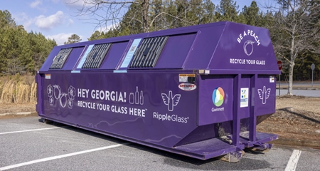 Glass recycling purple dumpster